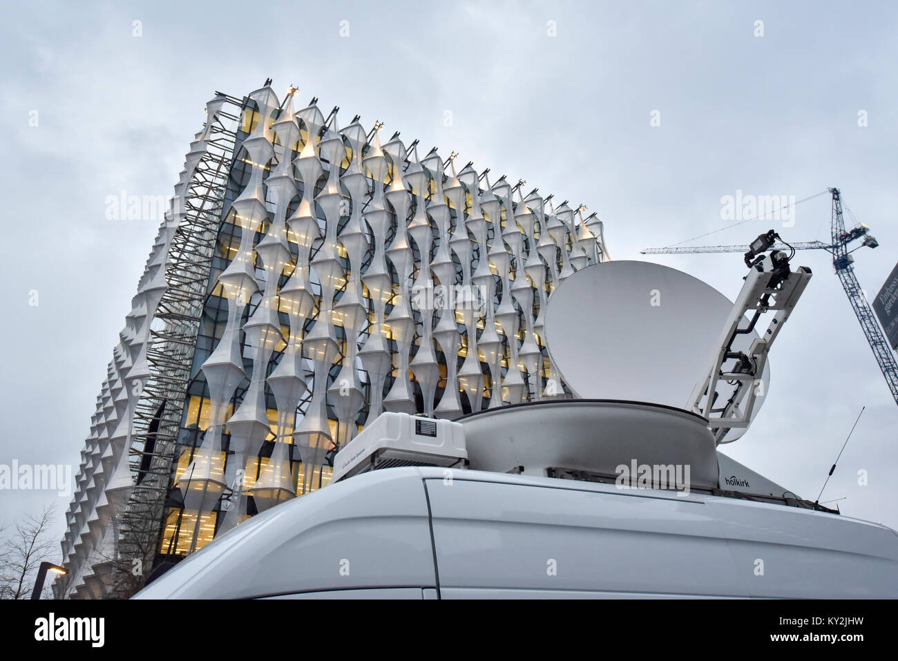 London, UK. 12th Jan, 2018. The satellite dish atop a TV media truck is seen outside the new US Embassy in Nine Elms, designed by US firm Kieran Timberlake. Donald Trump, President of the United States, has stated that he will not be visiting the UK for the upcoming opening of the property amidst protest fears. Instead, Rex Tillerson, US Secretary of State, will attend in his place. Credit: Stephen Chung/Alamy Live News Stock Photo