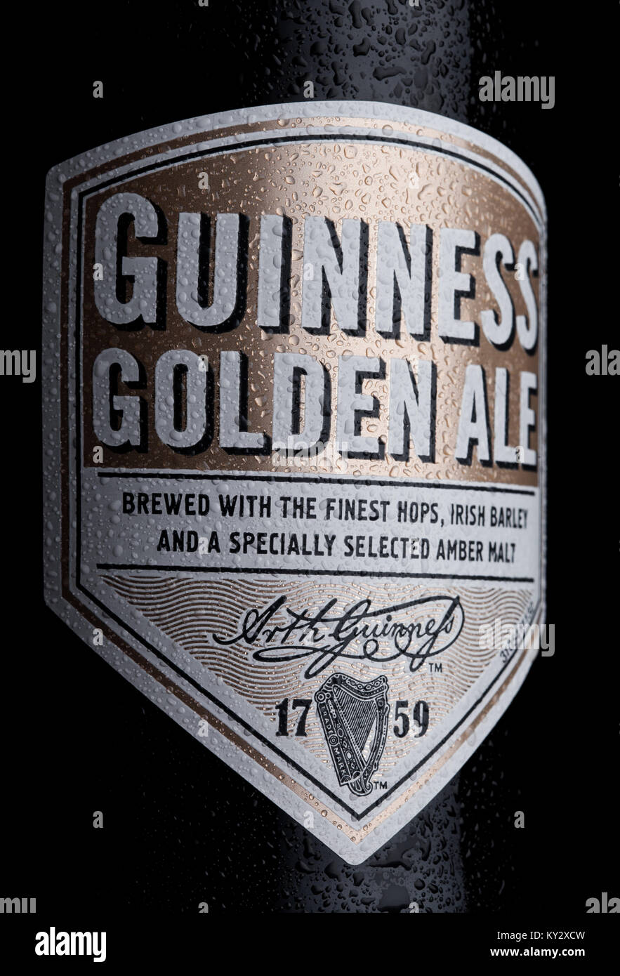 LONDON, UK - JANUARY 02, 2018:  Bottle label of Guinness golden ale beer on white background. Guinness beer has been produced since 1759 in Dublin, Ir Stock Photo