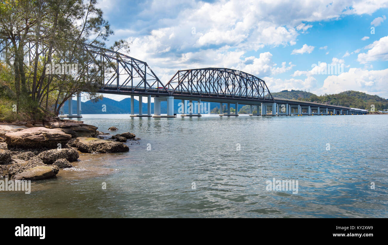 The original Peats Ferry Bridge near Brooklyn NSW stands beside the newer concrete Brooklyn Bridge as they cross the Hawkesbury River Stock Photo