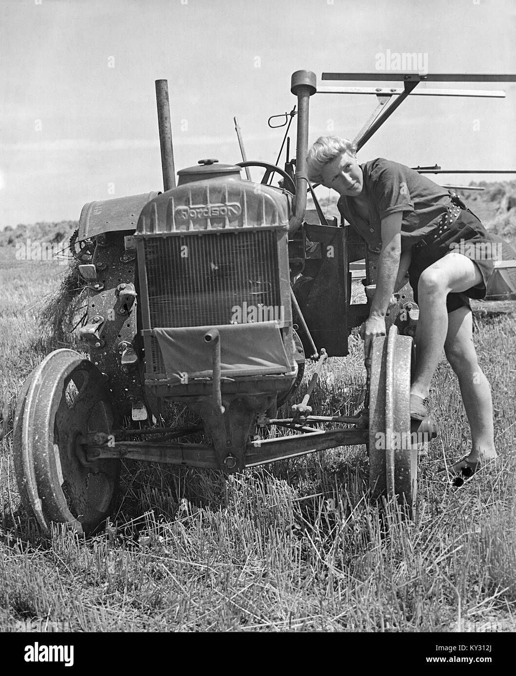 Fordson Tractor with Land Girls in 1940's Stock Photo