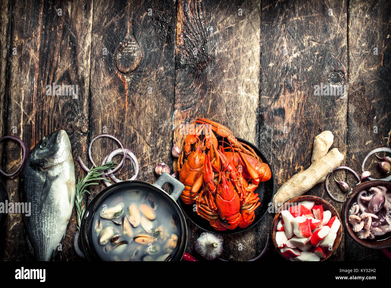 Different seafood on table. On a wooden background Stock Photo Alamy