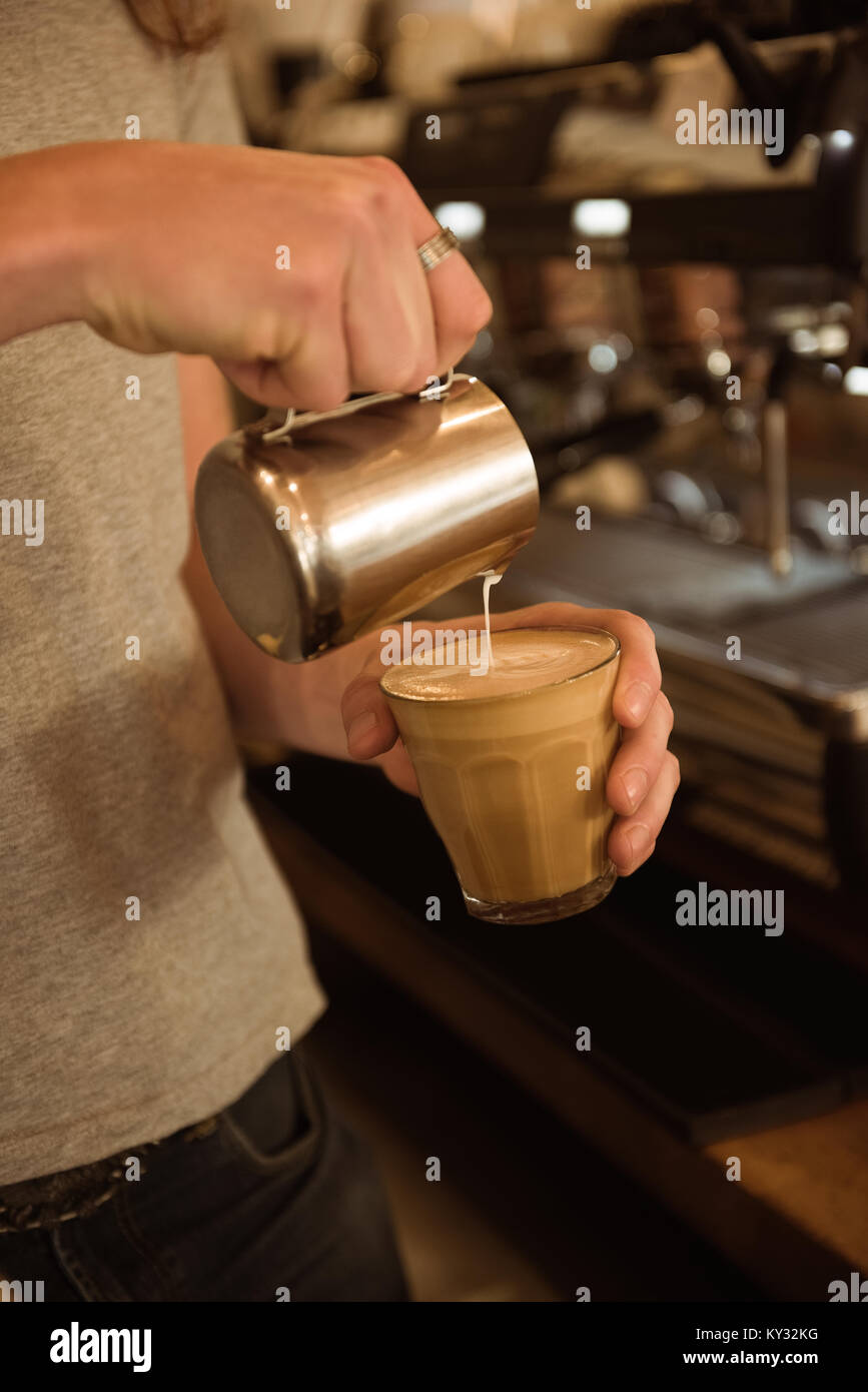 Young Barista Making Coffee High Resolution Stock Photography and