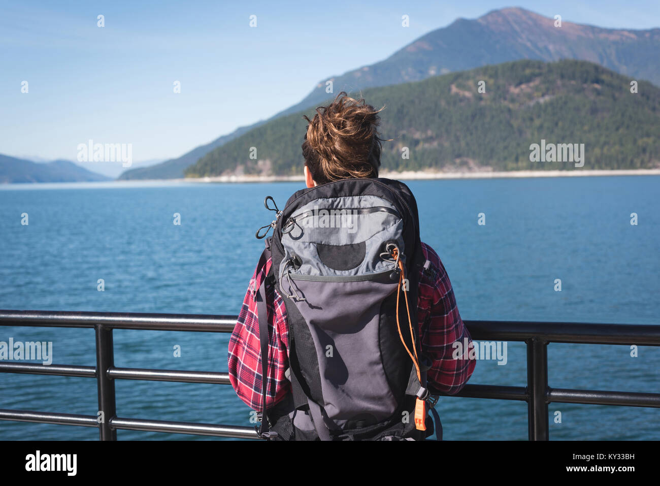 Rear view of female hiker looking at view Stock Photo - Alamy