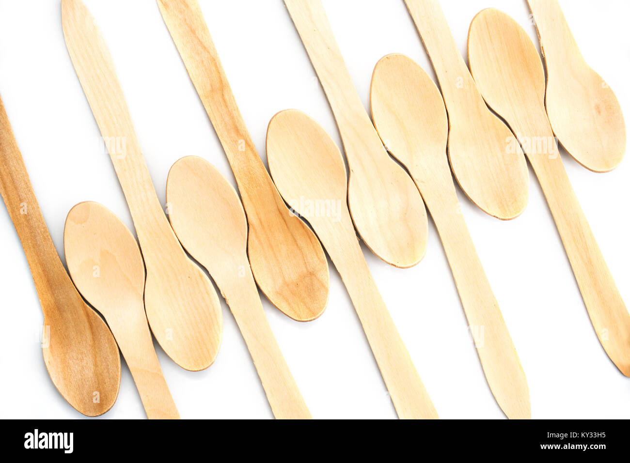 Wooden spoon composition on white background Stock Photo