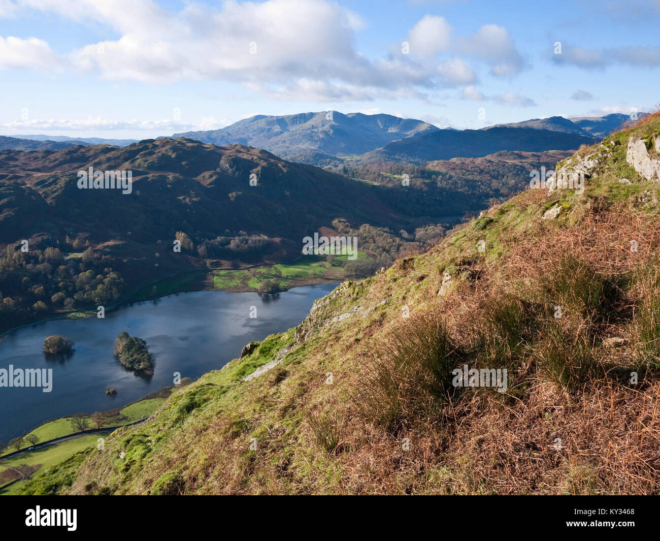 The Coniston Fells viewed across Rydal Water from Nab Scar on Heron Pike. Loughrigg Fell rises behind the lake. Near Ambleside, Cumbria Stock Photo