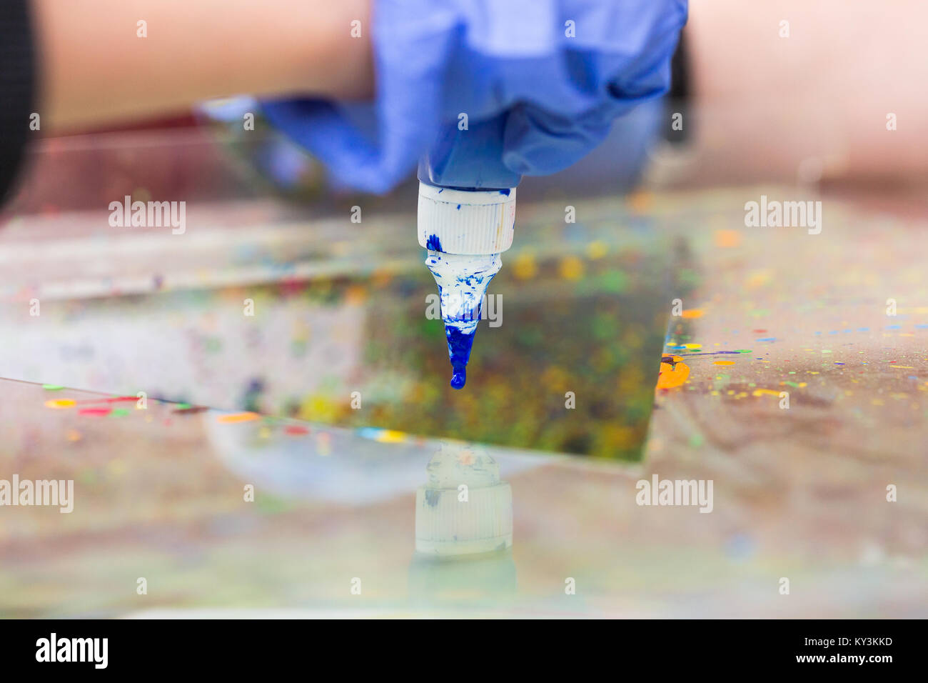 art equipment, tools, crafting concept. close up of the tip of tube of acrylic paint, that is