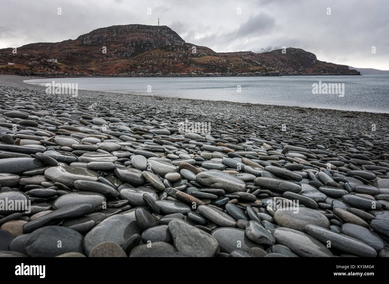 Beautiful flat pebbles on the pebble beach at Ardmair, near Ullapool