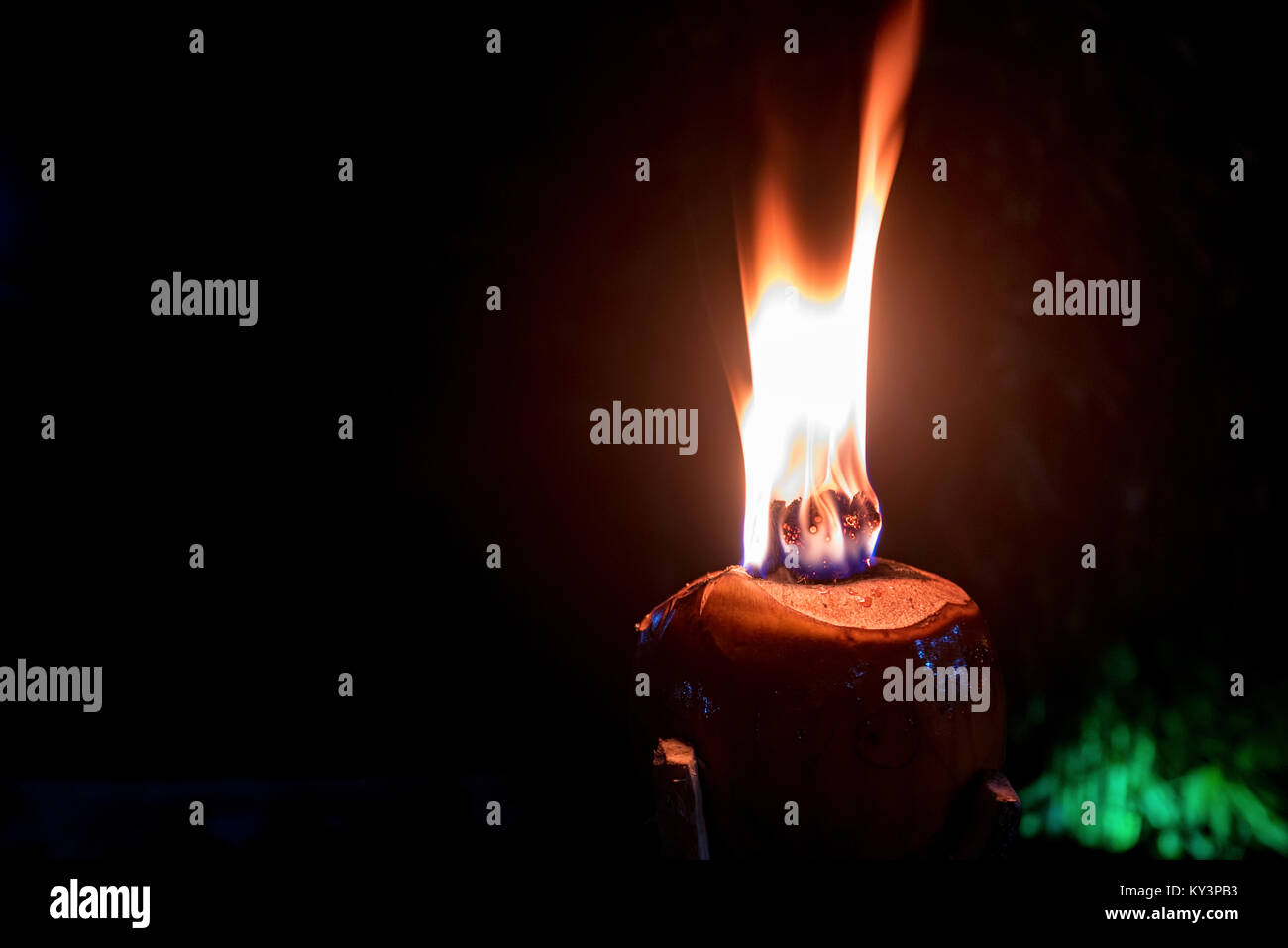 Burning torch made of coconut Stock Photo Alamy