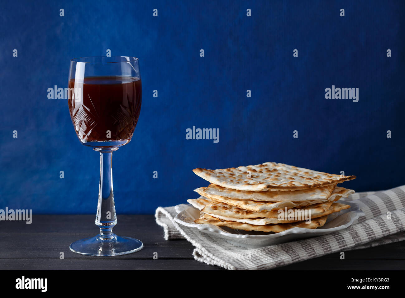 A Jewish Matzah bread with wine. Passover holiday concept Stock Photo ...