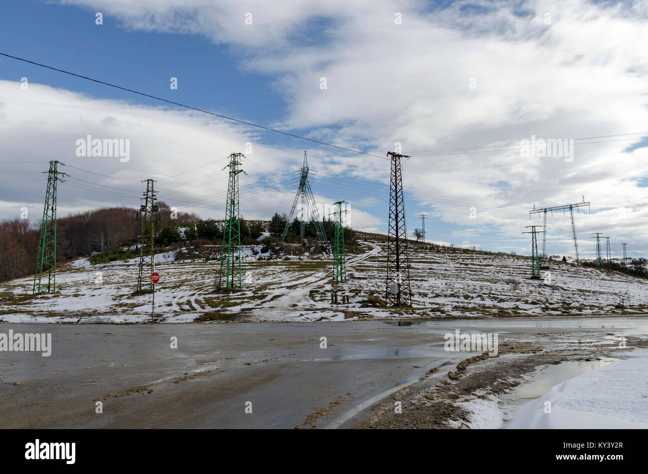 Electric power transmission line in winter, Plana mountain, Bulgaria
