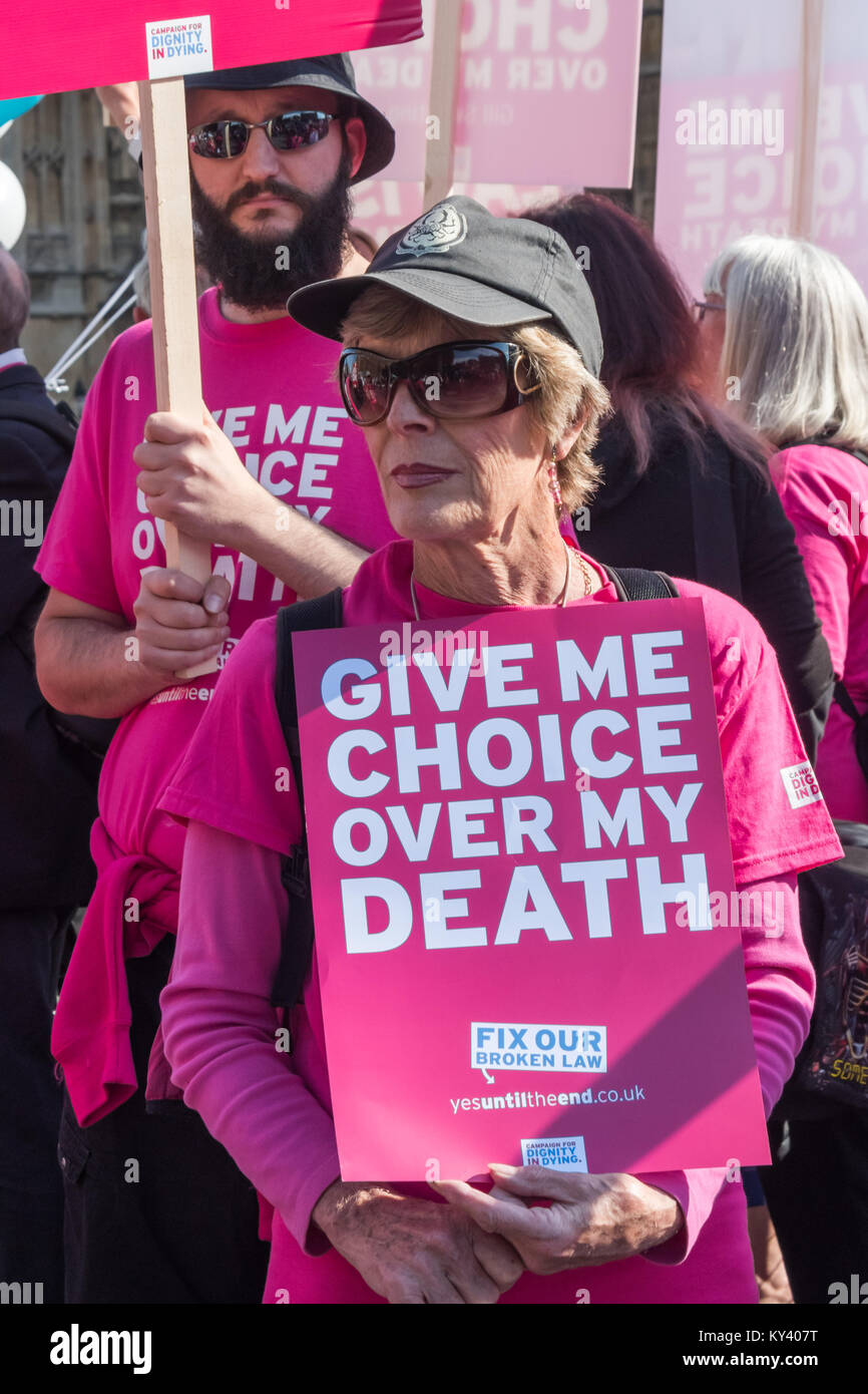Supporters of the Assisted Suicide Bill in Old Palace Yard with posters and t-shirts 'Give Me Choice over My Death'. Stock Photo