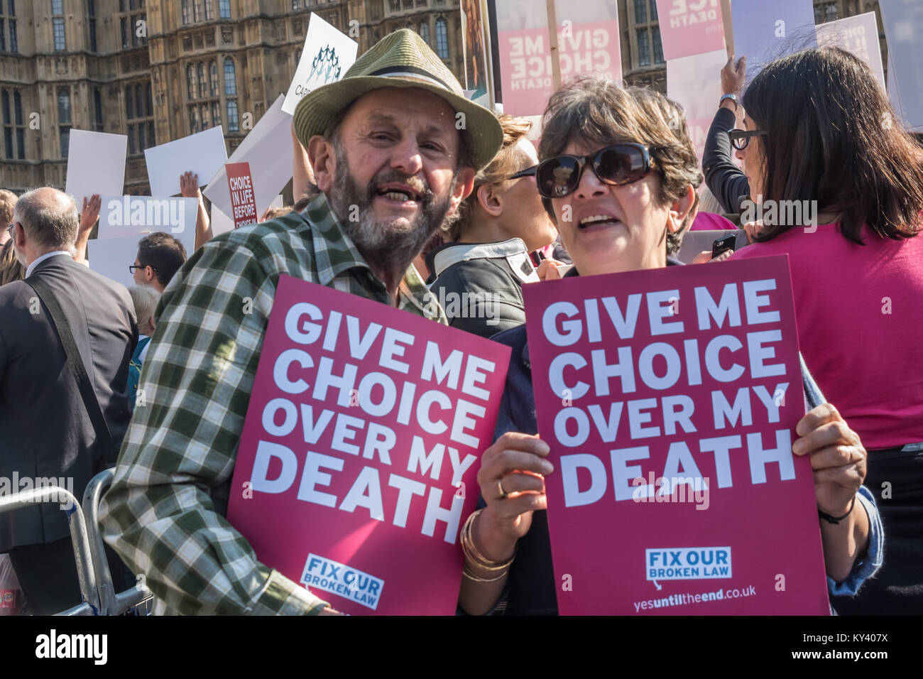 Supporters of the Assisted Suicide Bill in Old Palace Yard  debated in Parliament with posters  'Give Me Choice over My Death'. Stock Photo