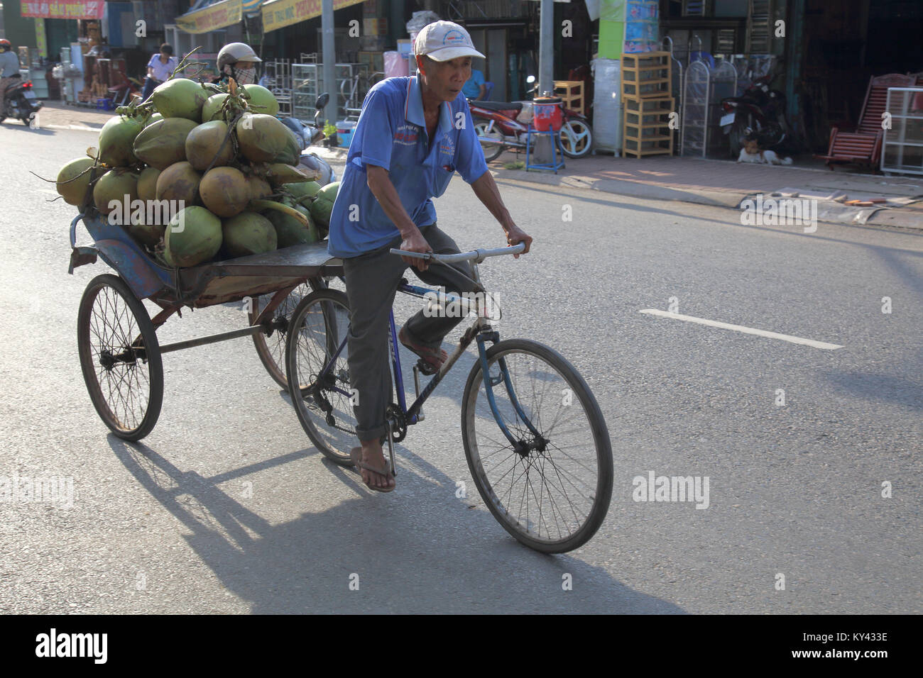 making deliveries by bicycle in chau doc vietnam Stock Photo