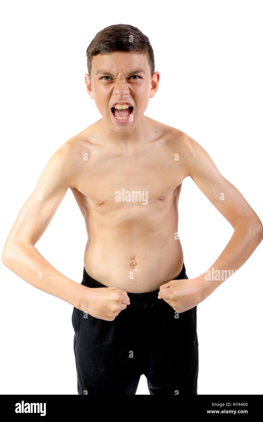 Shirtless teenage boy flexing his muscles isolated on white background  Stock Photo - Alamy