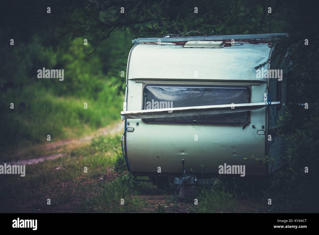 Aged and Damaged Abandoned Travel Trailer in the Middle of Nowhere ...
