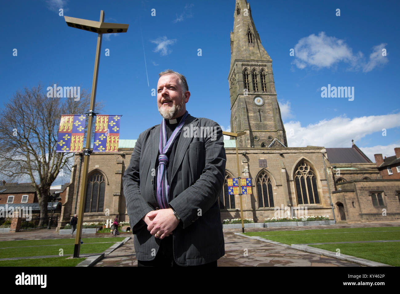 The Reverend David Monteith, dean of Leicester, pictured outside the city's cathedral. The local football club, Leicester City, were on the brink of being surprise winners of the English Premier League in the 2015-16 season. Stock Photo