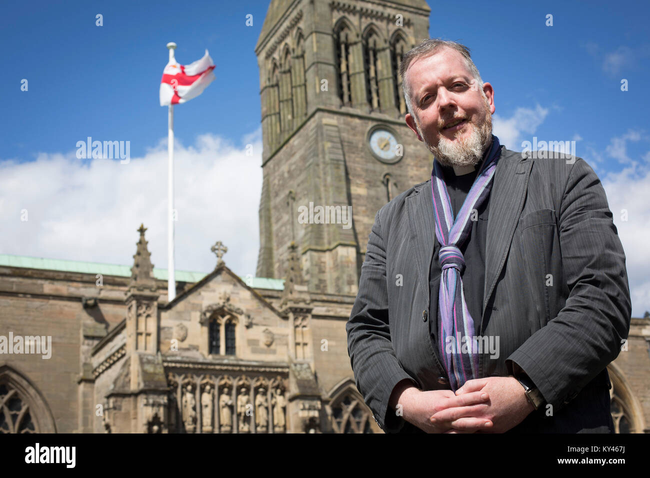 The Reverend David Monteith, dean of Leicester, pictured outside the city's cathedral. The local football club, Leicester City, were on the brink of being surprise winners of the English Premier League in the 2015-16 season. Stock Photo