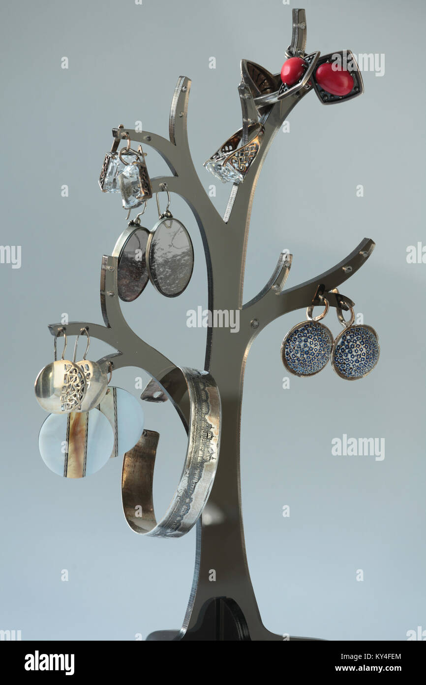 collection of vintage jewelry on tree Stock Photo