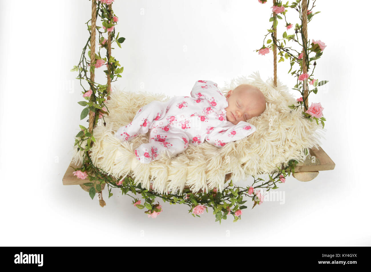 baby girl sleeping on swing Stock Photo Alamy