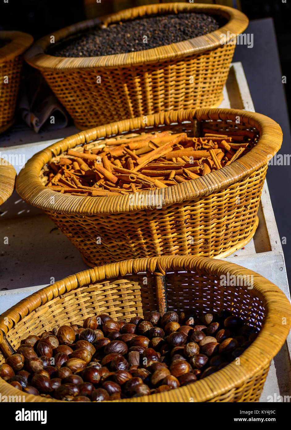 Kerala Spices in traditional bamboo basket Stock Photo