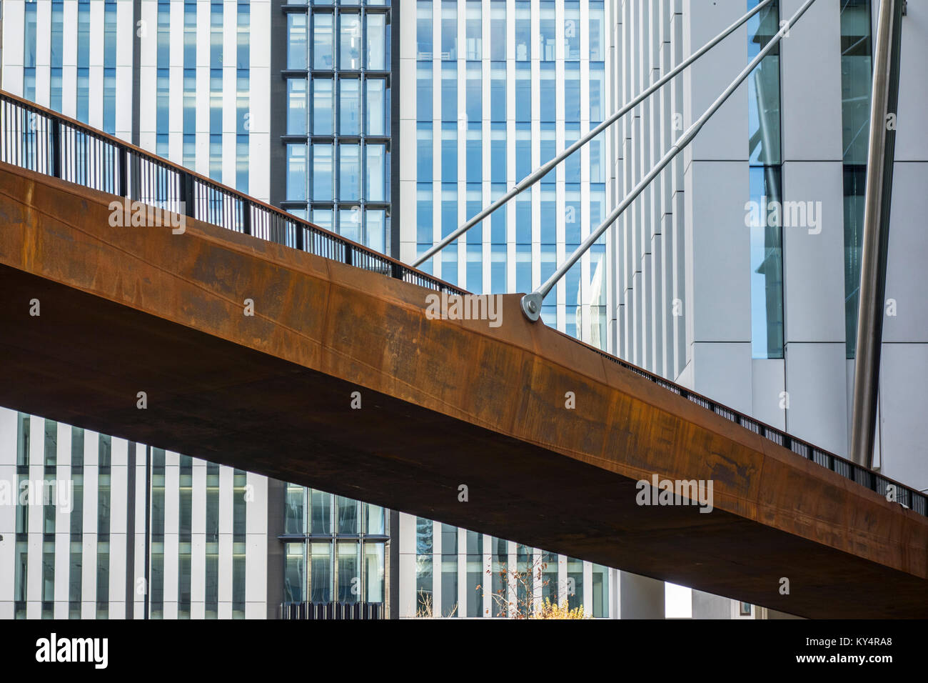 New rusty steel bridge raised walkway at the London Wall Place development, City of London, UK Stock Photo