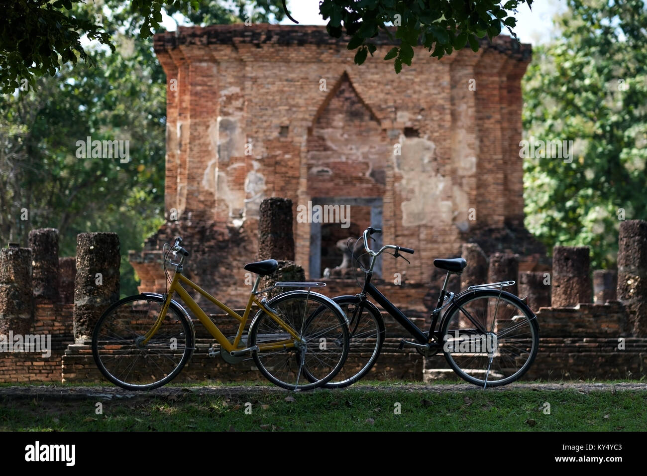 bicycle near the wall of old temple in Sukhothai, Old Town. Stock Photo