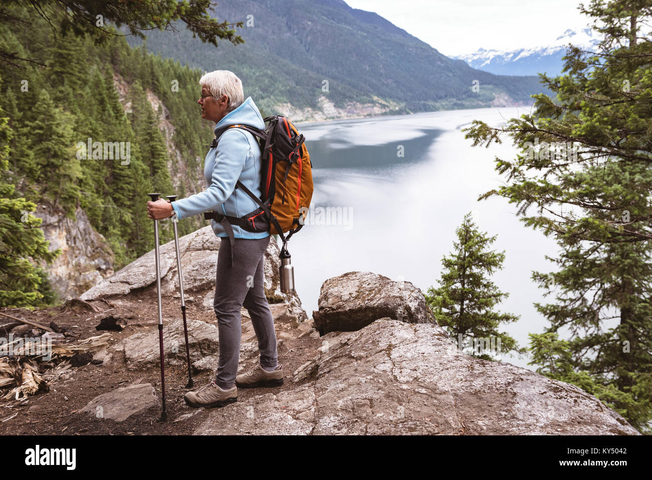Mature woman walking forest hi-res stock photography and images - Alamy