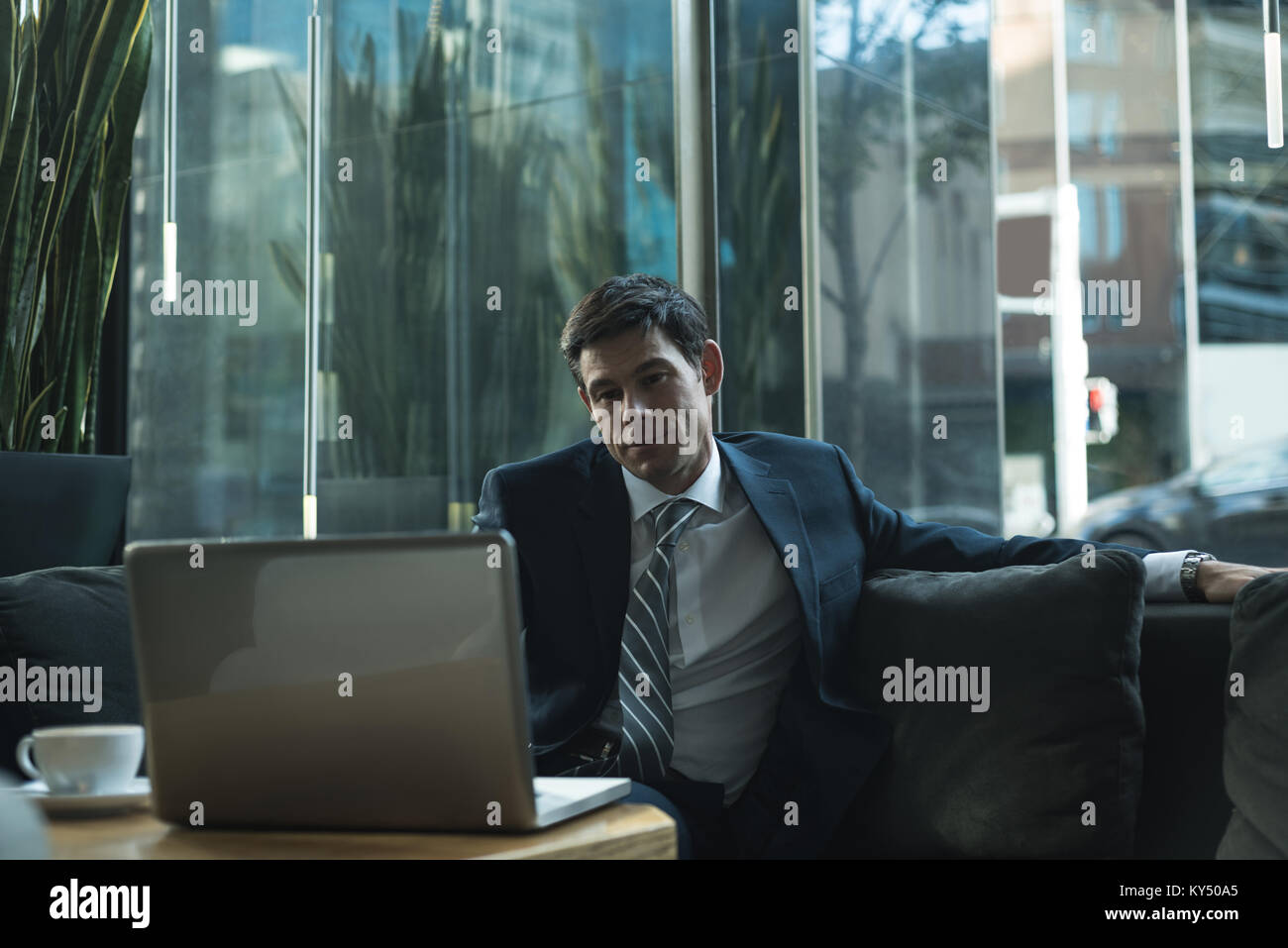 Businessman using laptop Stock Photo