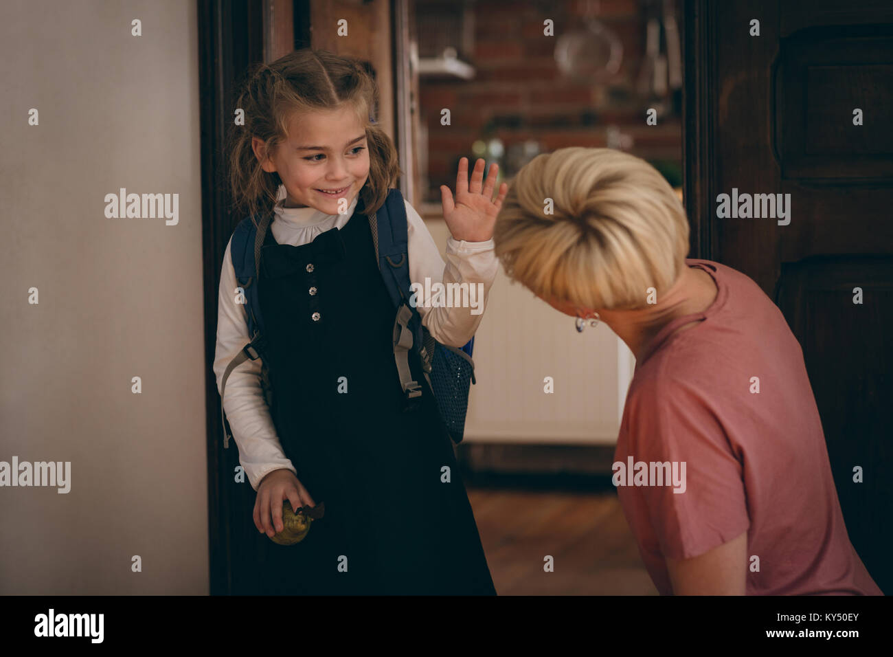 Child school uniform adult home hi-res stock photography and images - Alamy