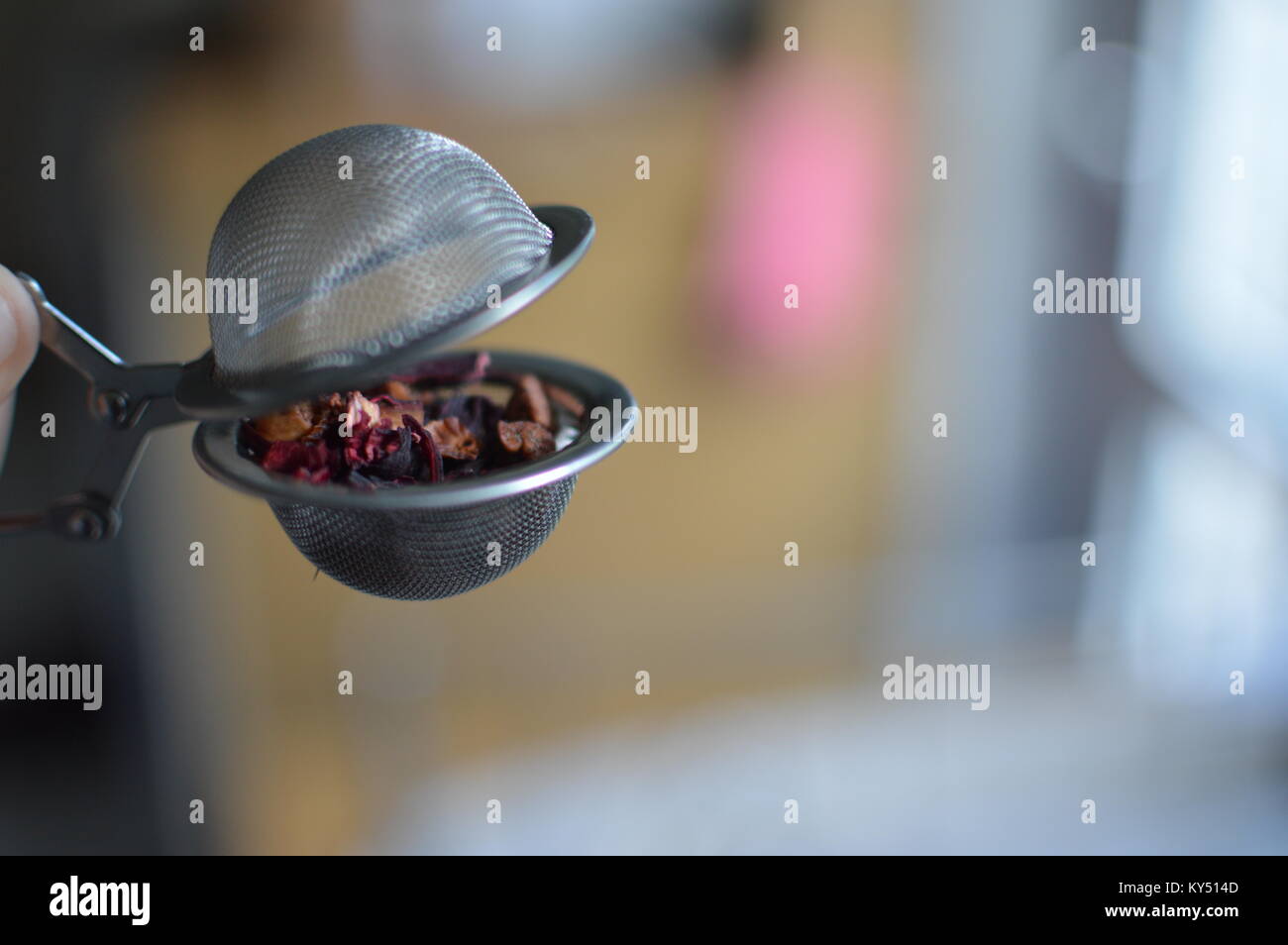 Loose leaf tea in an open tea infuser Stock Photo Alamy