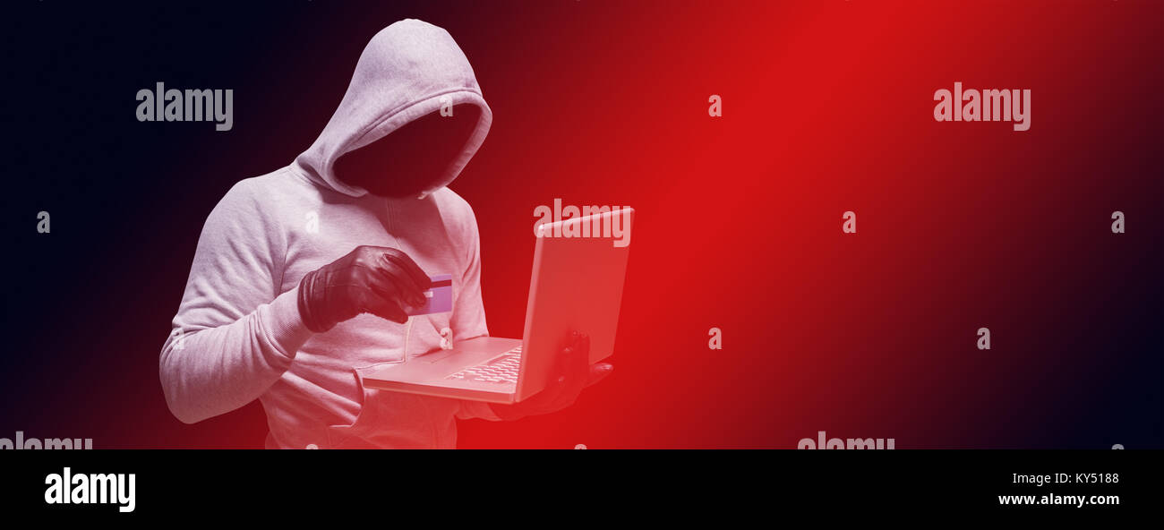 Hacker using credit card for cyber crime Stock Photo Alamy