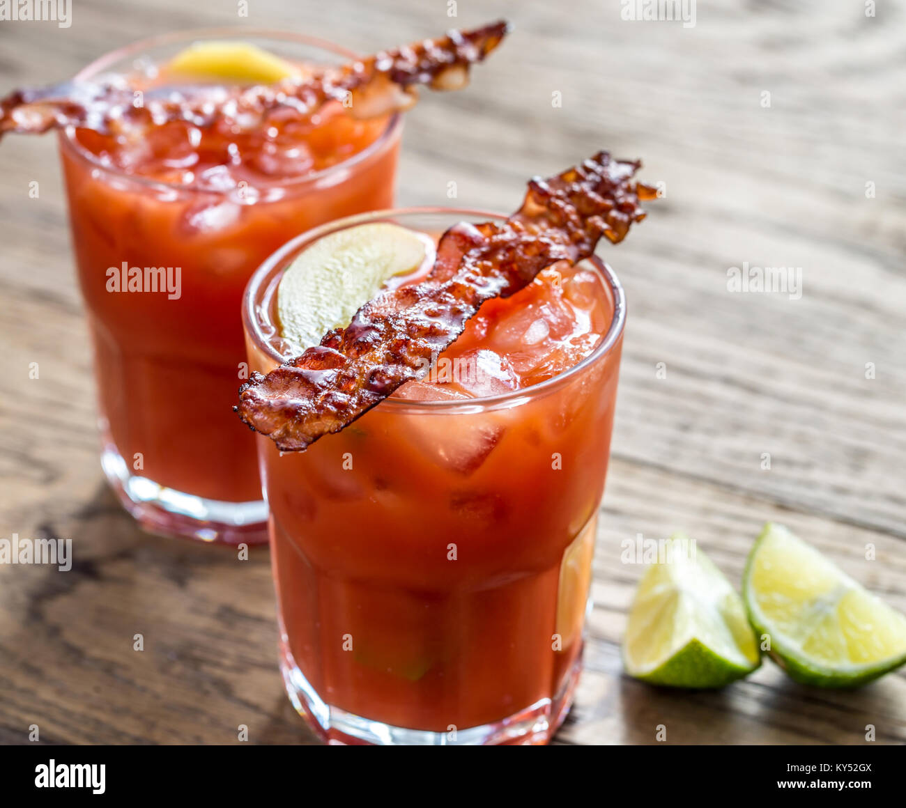 Two glasses of Bloody Mary with bacon rashers Stock Photo Alamy