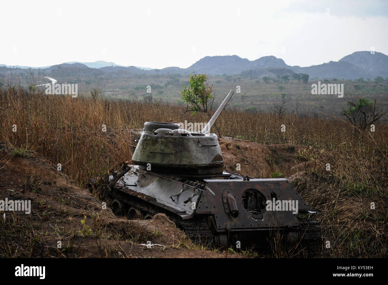 ANGOLA old military tank from civil war between MPLA and UNITA near Quibala, some areas have land mines and make agriculture impossible Stock Photo