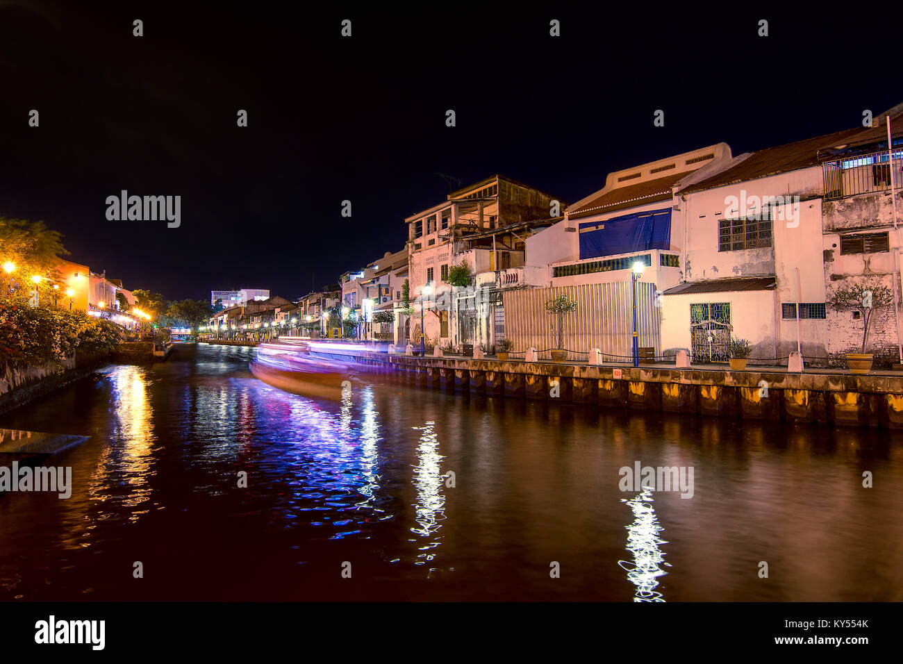 Melaka Malaysia City river running through Melaka with tourist boat. Stock Photo