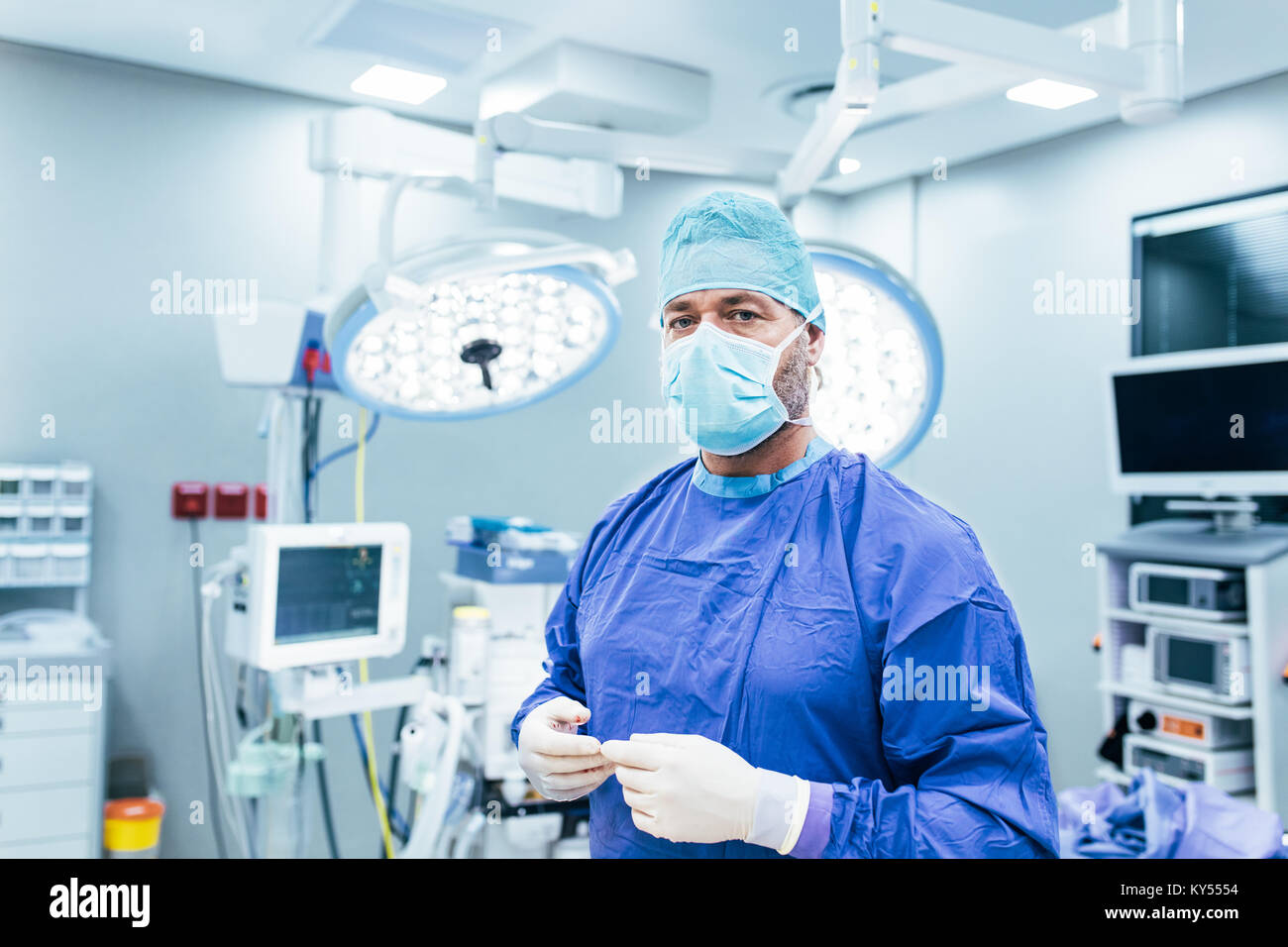 Portrait Of Male Surgeon In Operation Theater Looking At Camera Doctor