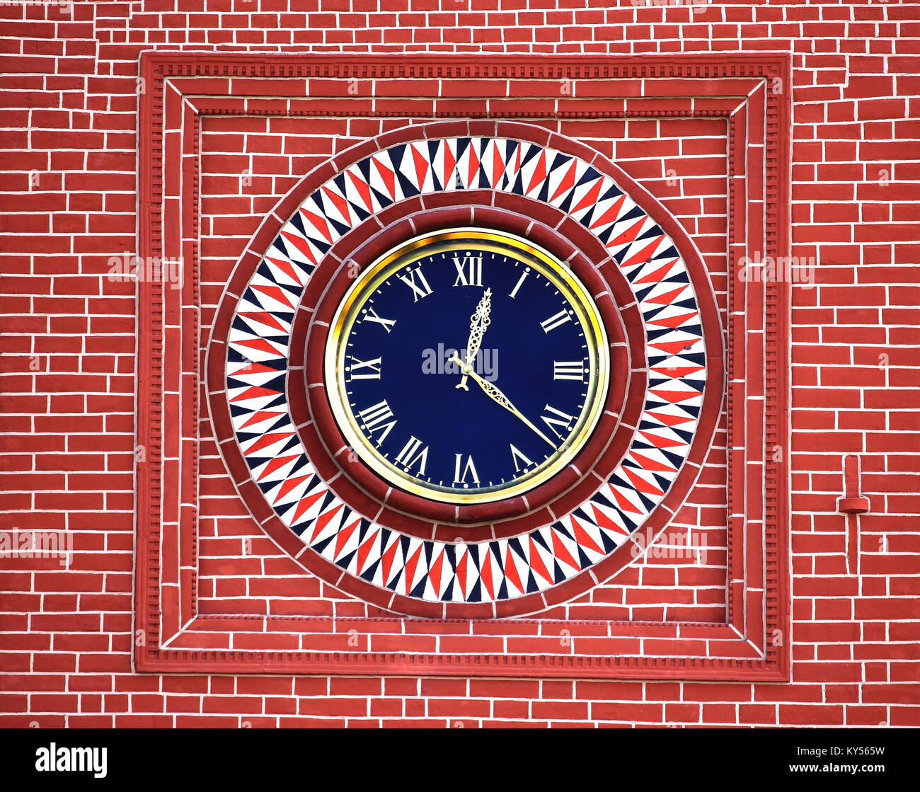 Wall Watch Design Rome Watch with roman dial on the red brick wall Stock Photo - Alamy