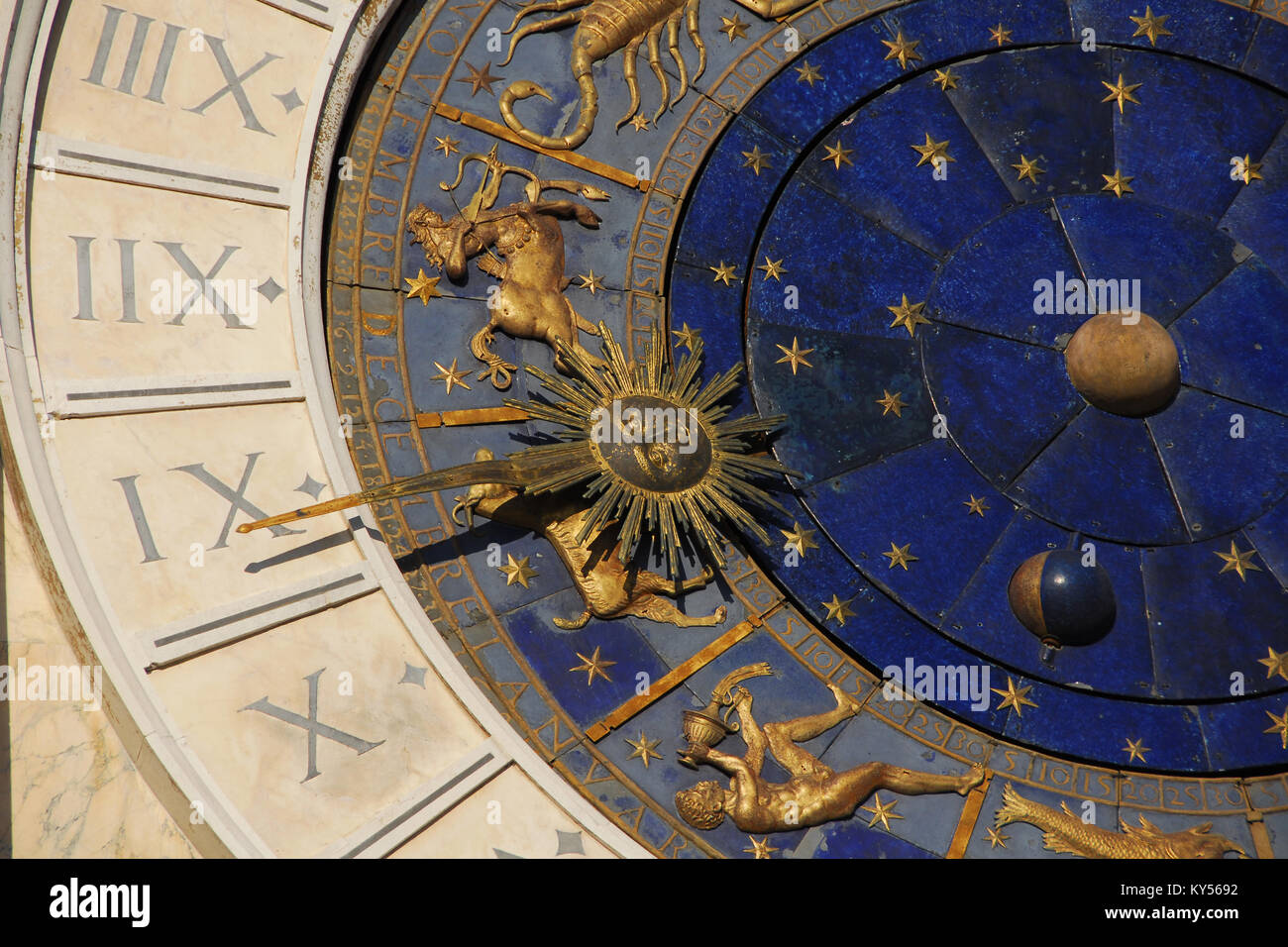 Ancient time and Astrology. Detail of Saint Mark Square renaissance Clock Tower in Venice with zodiac signs, planet and stars (15th century) Stock Photo