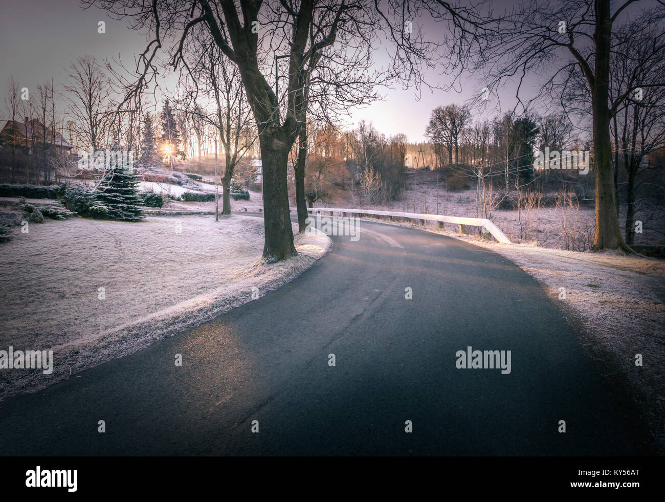 Asphalt road in winter Stock Photo - Alamy