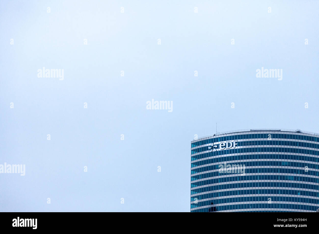 PARIS, FRANCE - DECEMBER 20, 2017: EDF logo on their main office in La Defense district. Electricite de France (EDF) is the main French electric utili Stock Photo