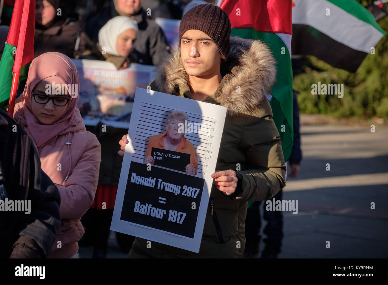 January 7, 2018 - MalmÃ, SkÃ¥ne, Sweden - A protester seen with a placard during the protest.Demonstration of protest against the decision of Donald Trump, in violation of the international right, to recognize Jerusalem as capital of Israel hosted in the city of Malmo. Credit: Magnus Persson/SOPA/ZUMA Wire/Alamy Live News Stock Photo