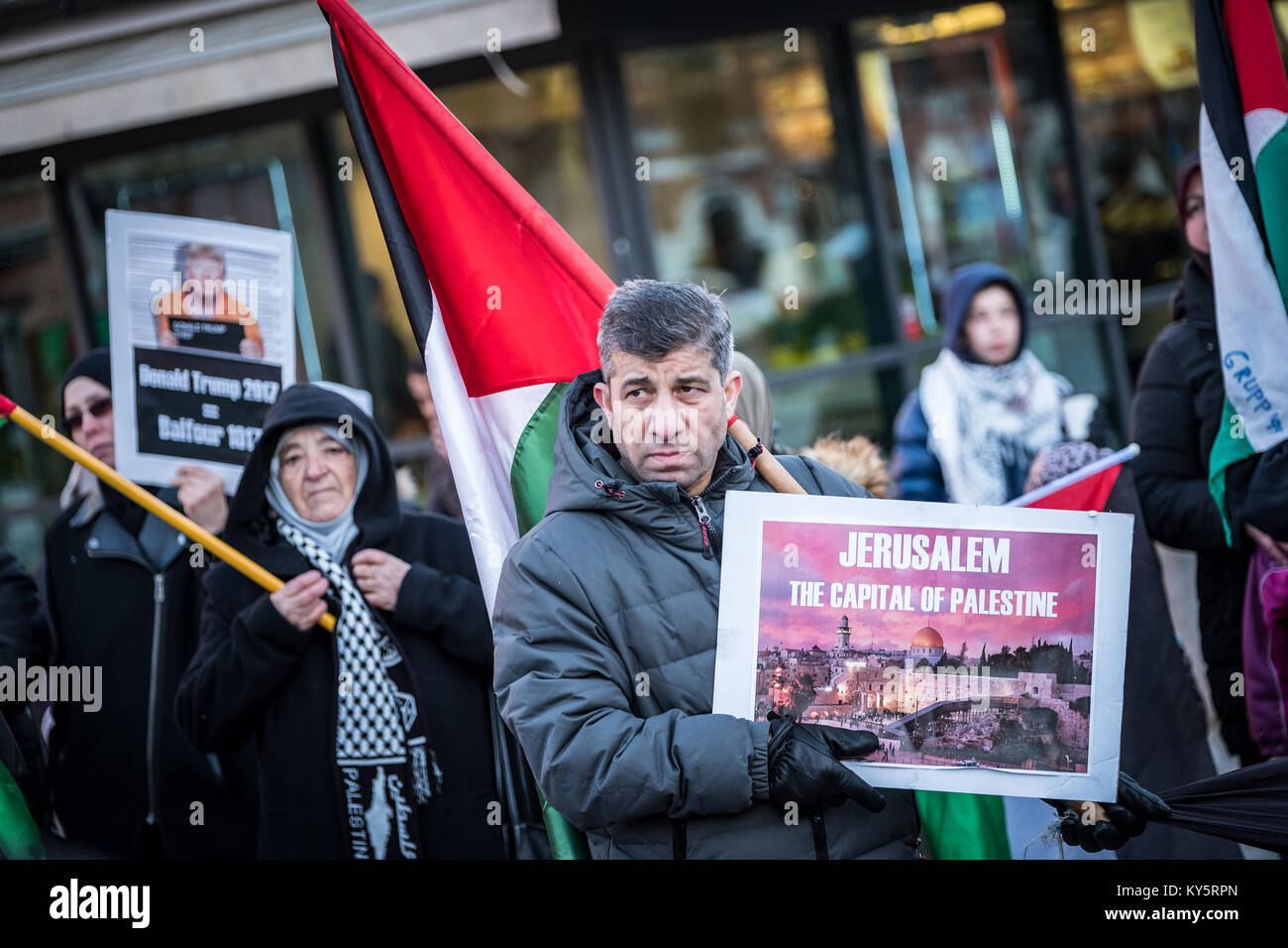January 7, 2018 - MalmÃ, SkÃ¥ne, Sweden - A man seen holding a placard during the protest.Demonstration of protest against the decision of Donald Trump, in violation of the international right, to recognize Jerusalem as capital of Israel hosted in the city of Malmo. Credit: Magnus Persson/SOPA/ZUMA Wire/Alamy Live News Stock Photo