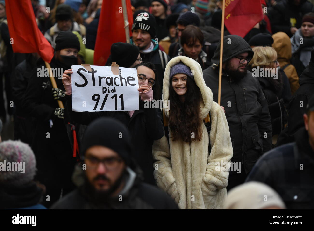 Vienna, Austria. 13th Jan, 2018. protester holding a sign critical of Austria's vice-chancellor Heinz-Christian Strache. Credit: Vincent Sufiyan/Alamy Live News Stock Photo
