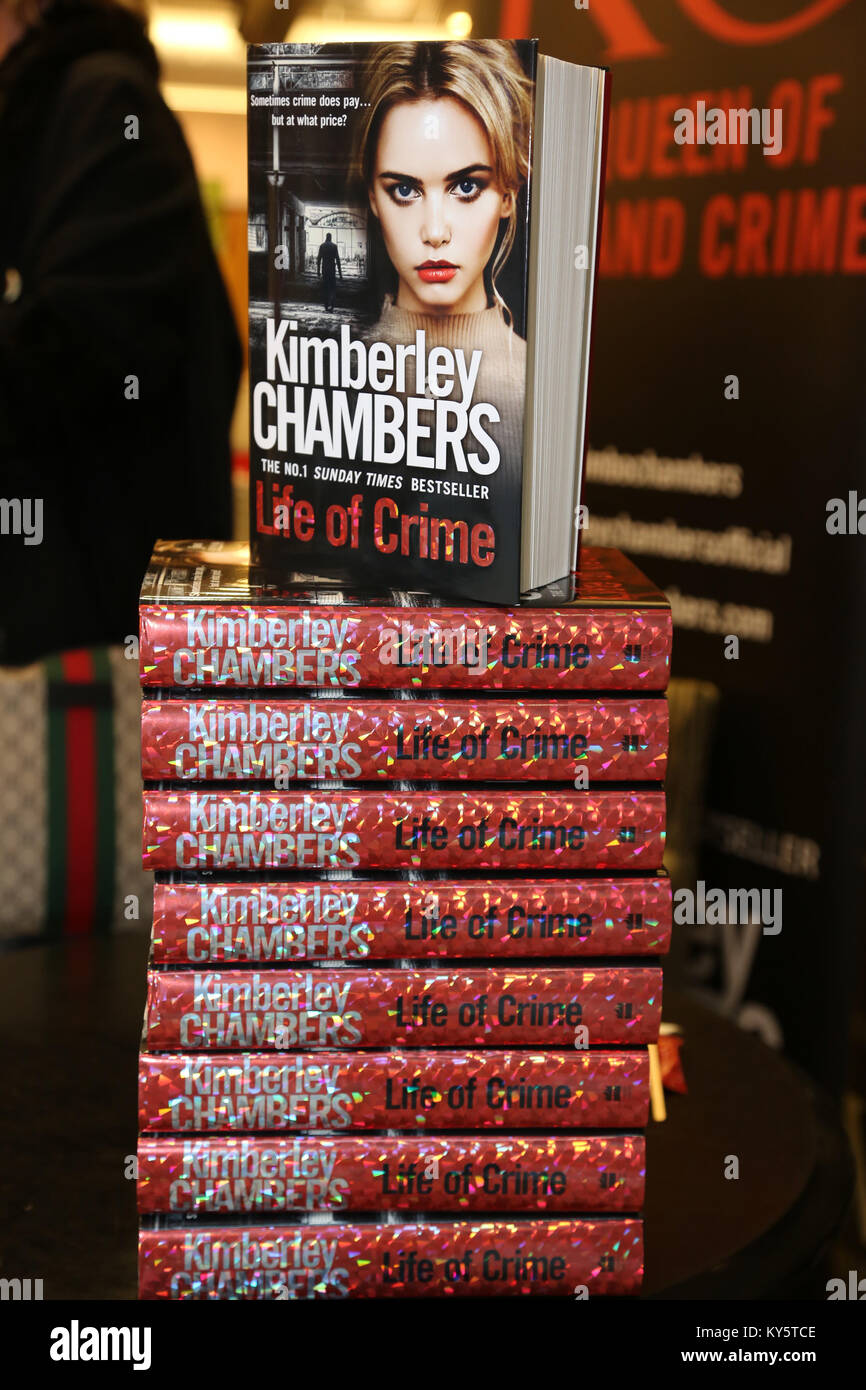 Romford Essex, UK. 13th Jan, 2018. Crime author Kimberley Chambers signs copies of her 13th and latest book Life of Crime at waterstones bookshop Romford Essex photo Credit: SANDRA ROWSE/Alamy Live News Stock Photo