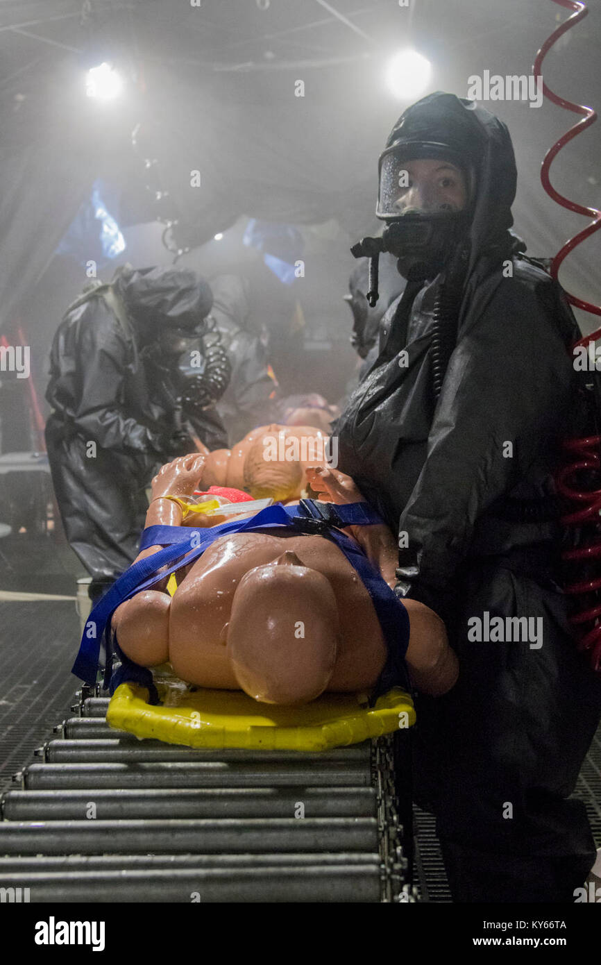 U.S. Army Soldiers decontaminate simulated casualties during a Mass Casualty Decontamination exercise at the Homestead-Miami Speedway, in Miami-Dade, Florida, Jan. 9, 2018. This is the 3rd in a series of joint training exercises between Active Duty, Guard, and Reserve Army units and local municipalities across the United States. This JTE focused on the decontamination and transportation of casualties in a simulated mass chemical attack. (DoD Stock Photo
