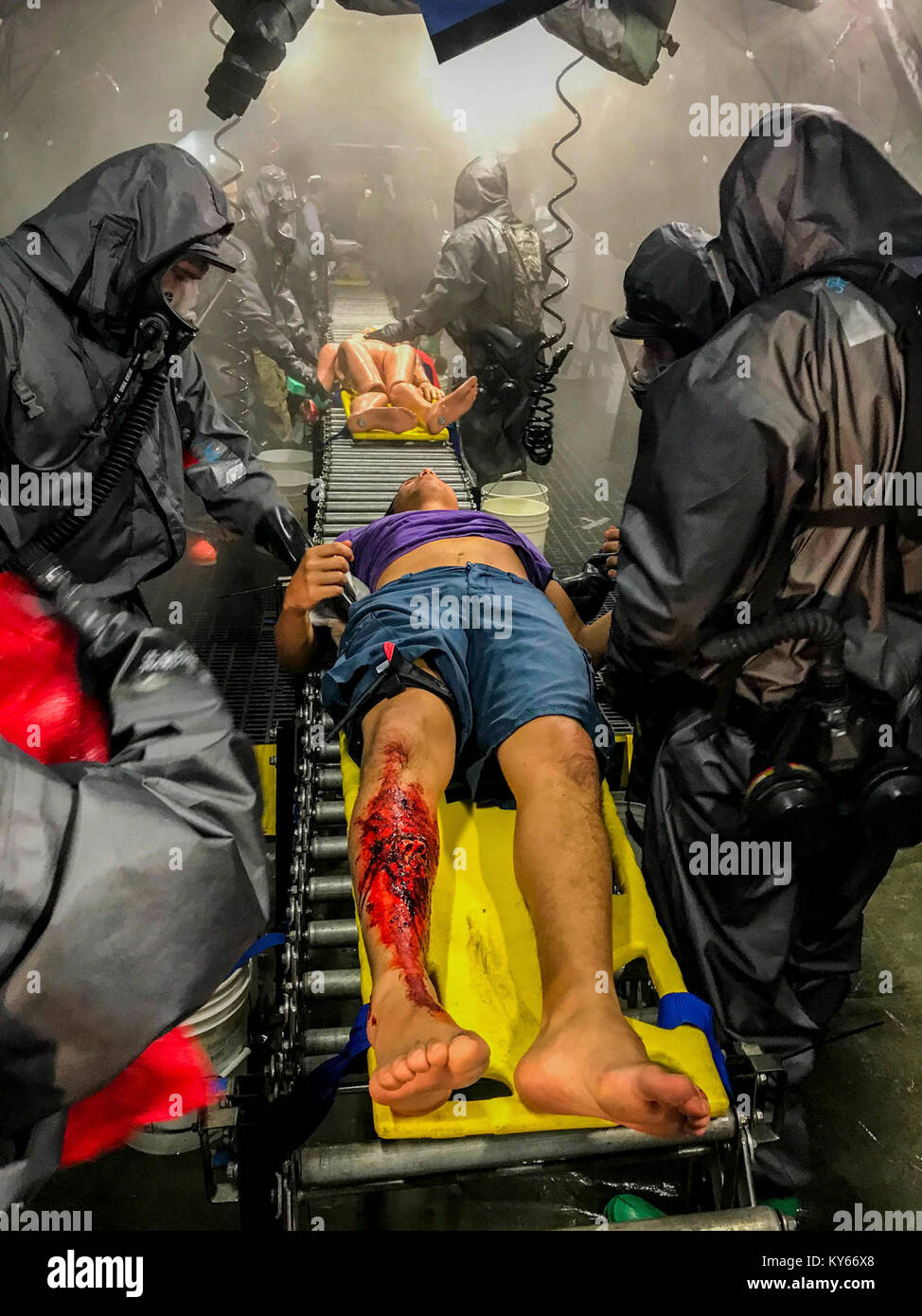 U.S. Army Active Duty, National Guard, and Reserve Soldiers along with local first responders participate in a Mass Casualty Decontamination exercise at the Homestead-Miami Speedway, in Miami-Dade, Florida, Jan. 9, 2018.  This is the 3rd in a series of joint training exercises between Active Duty, Guard, and Reserve Army units and local municipalities across the United States. This JTE focused on the decontamination and transportation of casualties in a simulated mass chemical attack. (DoD Stock Photo