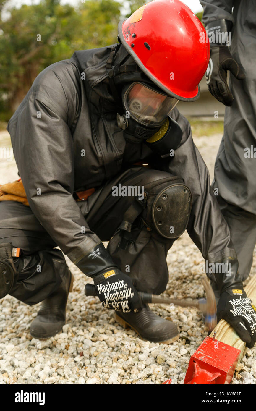 A U.S. Army Reserve Soldier assigned to 468th Firefighter Detachment works in a Joint Training Exercise at the Miami-Dade Fire Rescue Urban Search and Rescue Training Site in Miami, Fla. Jan. 10, 2018. This JTE focused on building response capabilities and seamless transition between the local first responders and the follow-on support provided by the National Guard and Active duty soldiers. (U.S. Army Stock Photo