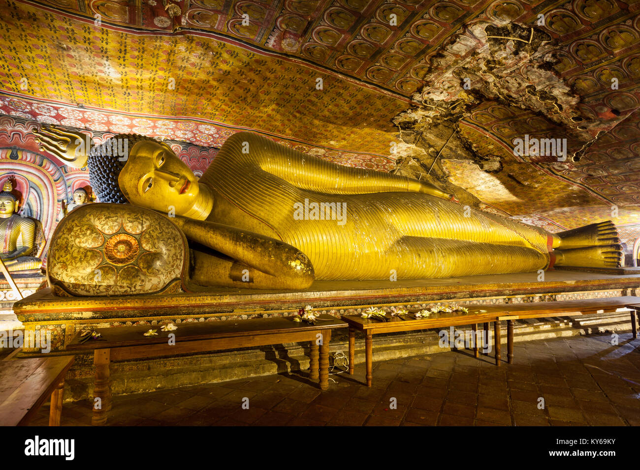 DAMBULLA, SRI LANKA - FEBRUARY 17, 2017: Sculpture of reclining Buddha inside Dambulla Cave Temple. Cave Temple is a World Heritage Site near Dambulla Stock Photo