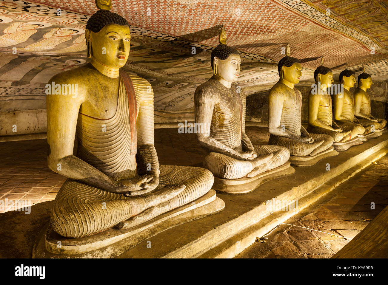 DAMBULLA, SRI LANKA - FEBRUARY 17, 2017: Buddha statues inside Dambulla Cave Temple. Cave Temple is a World Heritage Site near Dambulla city, Sri Lank Stock Photo