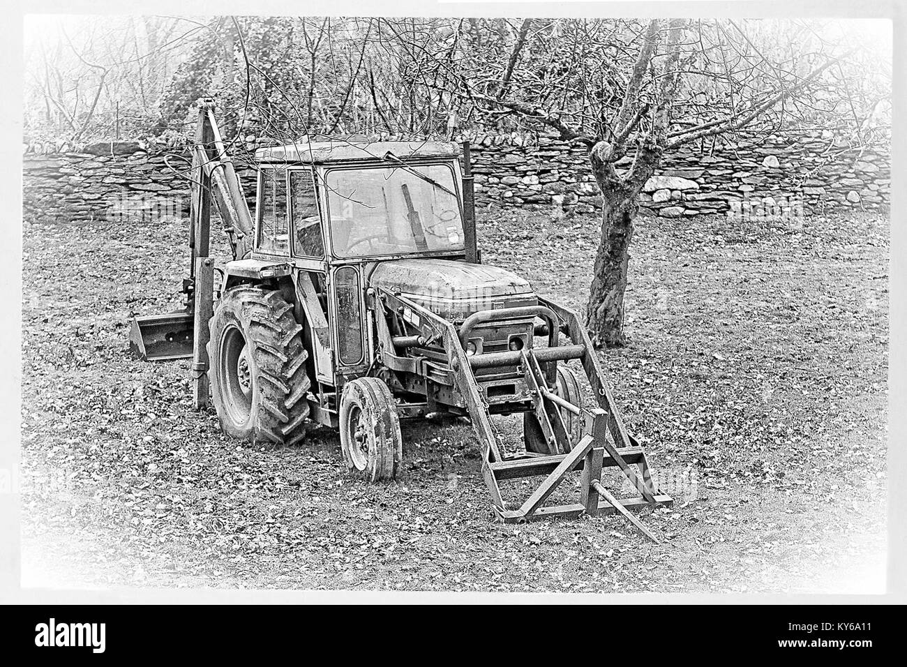 Vintage black and white of farmyard tractor Stock Photo - Alamy