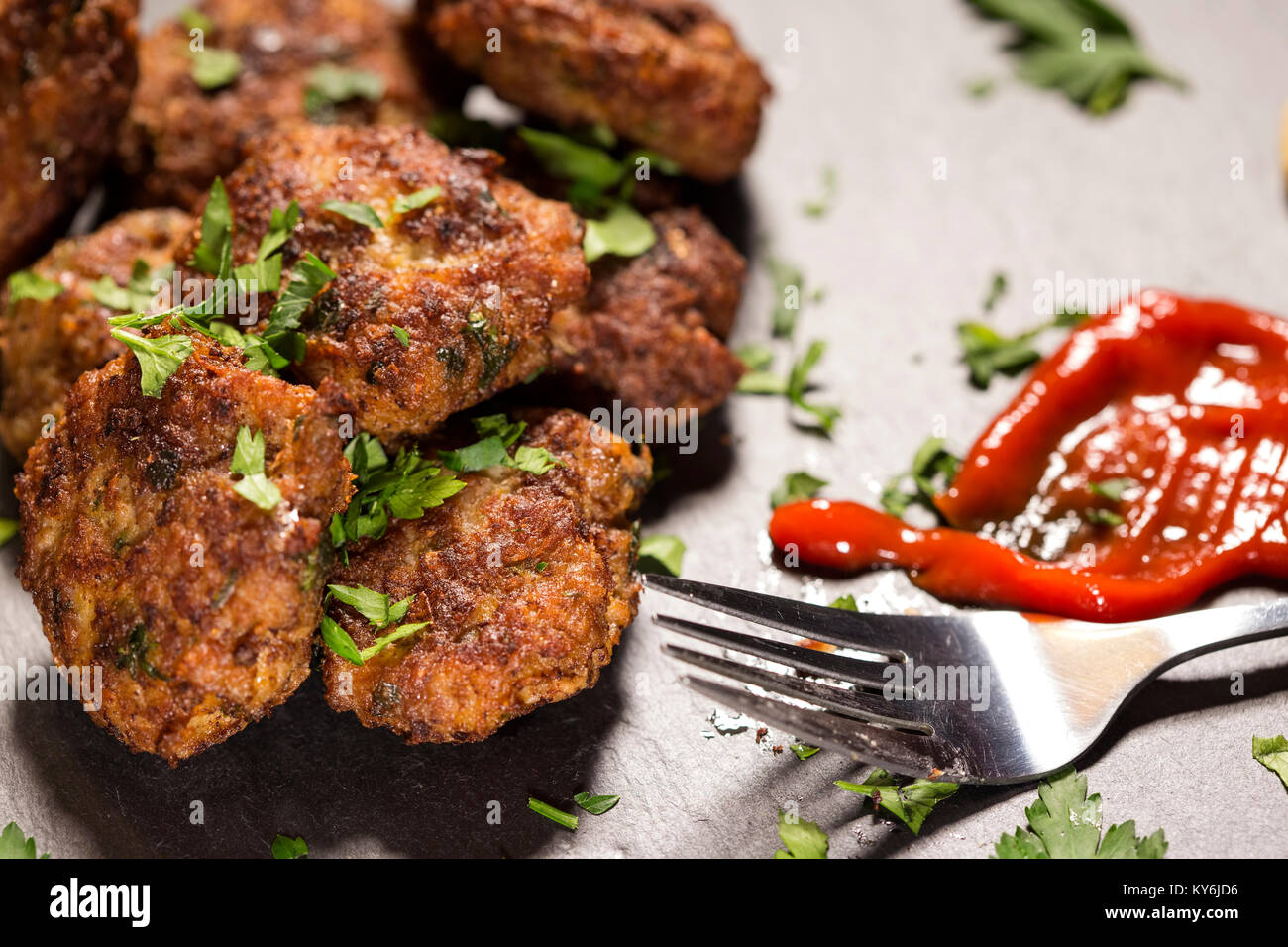 Eating homemade Meatballs made from pork, beef and vegetables with tomato sauce Stock Photo